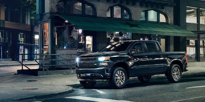 Chevrolet truck standing near apartment