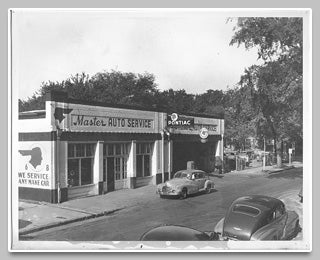 Vintage black and white picture of Master Auto Service Center.